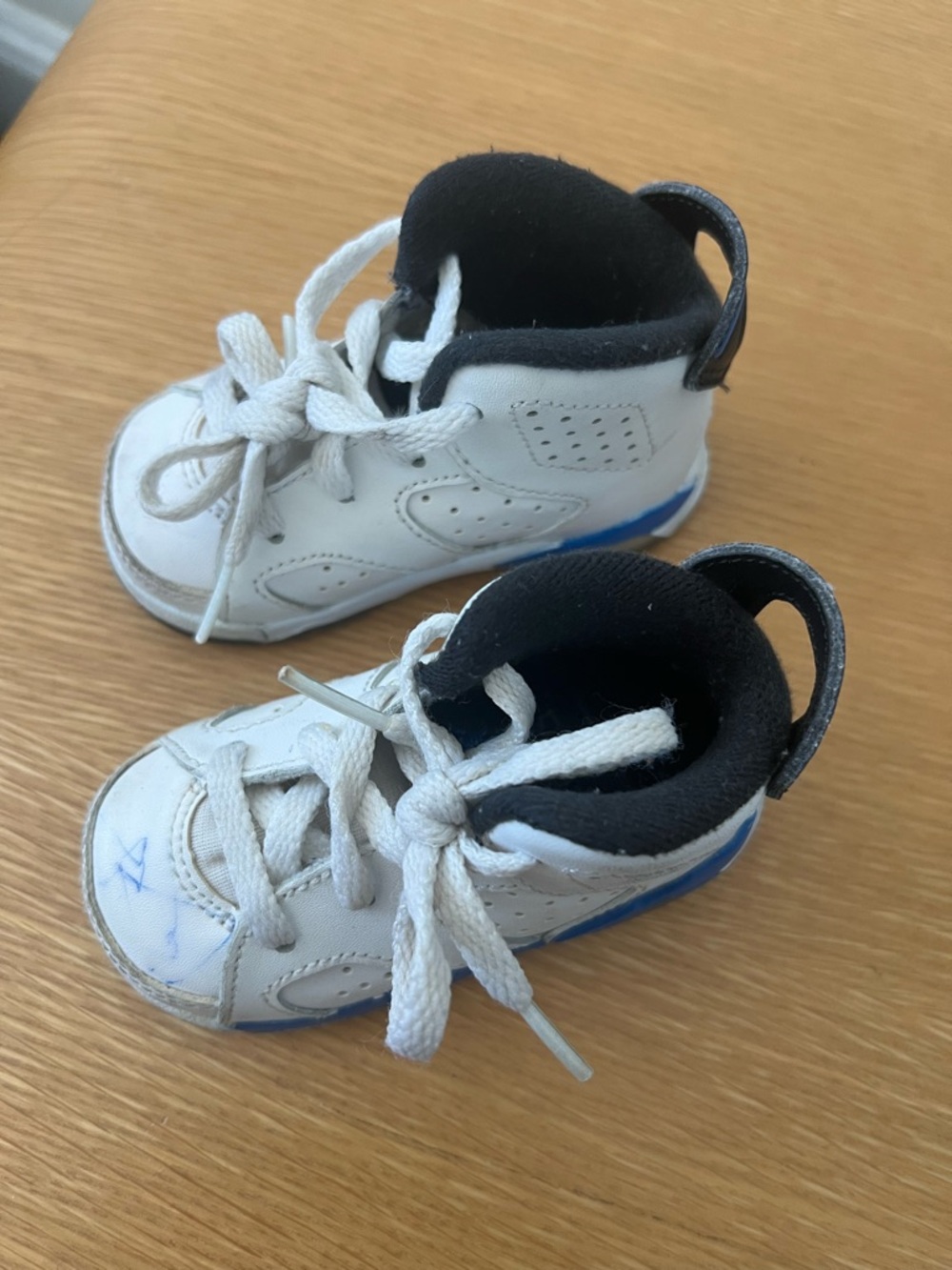 Nike White and Black Toddlers' High-Top Sneakers with Blue Sole Accent